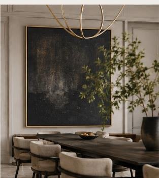 Dining room with a large dark abstract painting and a brass chandelier
